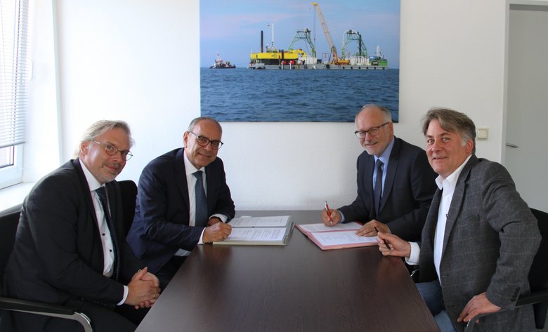 (v.l.): Prof. Dr. Marcus Bentin, Günter Illig, Prof. Dr. Gerhard Kreutz, Reimar Schlögl 